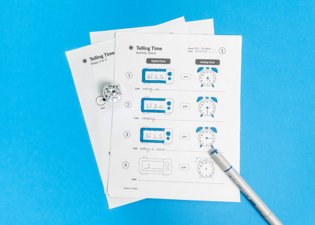 A picture showing an Ozobot STEAM activity sheet where studetns learn to tell time