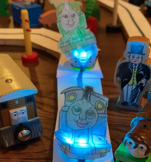 A picture of bots dressed up as Thomas the Tank Engine and friends.