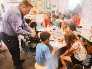 First graders learn how to code Pinellas County Schools using Ozobot.