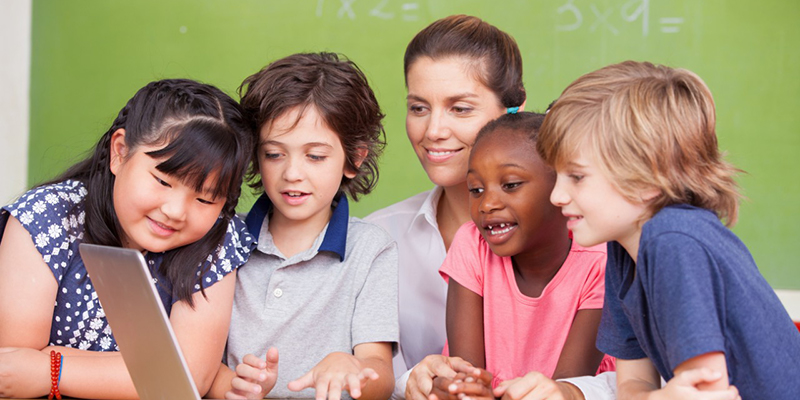 Students share a computer