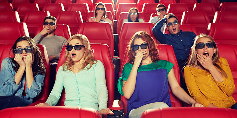 Audience watching a 3D movie